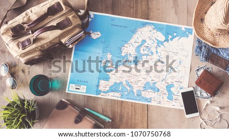 Travel concept on wooden background