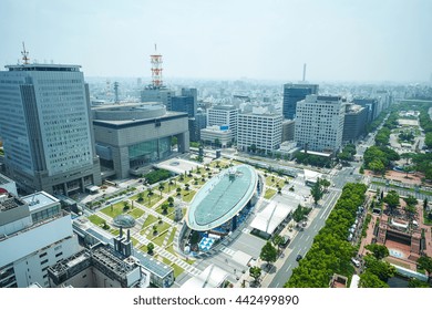 Travel Concept - Panoramic Modern City Bird Eye View On Nagoya TV Tower, Landmark Of Nagoya. Oasis21, Aichi Art Center And Holly Tree Plaza Under Modern City With Blue And Sunny Morning Sky In Japan