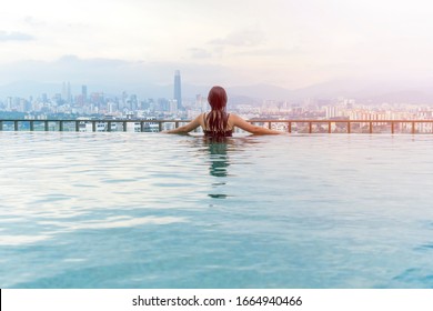 Travel Concept, Swimming pool on roof top with beautiful city view Kuala Lumpur malaysia