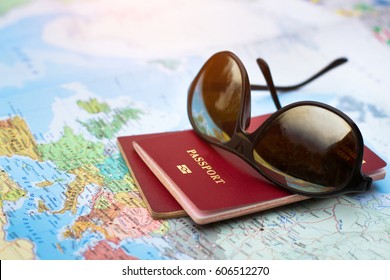 Travel Concept, Two Passports On The Map Of The World, Holidays Abroad