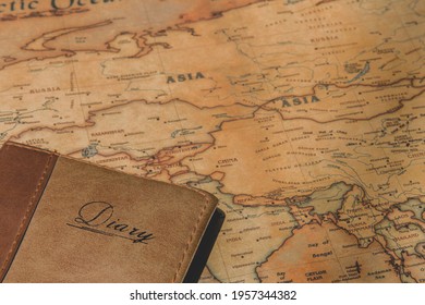 Travel Concept , World Map With Diary Book For Trip 