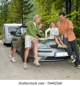 Travel - Family With Camping Car On The Road