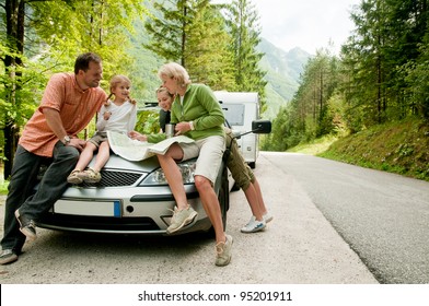 Travel - Family With Camping Car On The Road