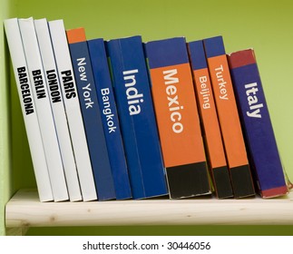 Travel Guide Books On A Shelf