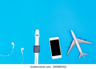 Travel handheld accessories objects on blue copy space - Shutterstock ID 690989353