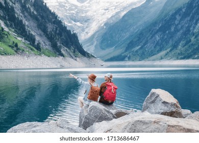 Travel Image. Travelers Team Look On The Mountain Landscape. Travel And Active Life Concept With Team. Adventure And Travel In The Mountains Region In The Austria