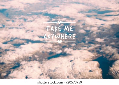 Travel inspirational quotes - Take me anywhere. Blurry background.