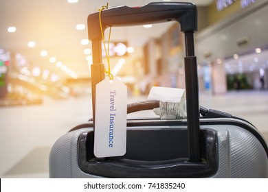 Travel Insurance Tag On Suitcase Holder With Tag Tied Letters Enjoyable Your Trip On Bag. Travel Insurance Is Intended Cover Medical Expenses, Cover Lost Luggage, Flight Cancellation Or Accident.