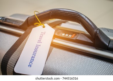 Travel Insurance Tag On Suitcase Near Numeric Combination Lock With Tag Tied Letters Enjoyable Trip.Travel Insurance Is Intended Cover Medical Expenses,cover Lost Luggage,flight Cancellation Accident.