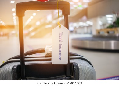 Travel Insurance Tag On Suitcase Holder With Tag Tied Letters Enjoyable Your Trip On Bag. Travel Insurance Is Intended Cover Medical Expenses, Cover Lost Luggage, Flight Cancellation Or Accident.