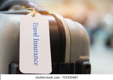 Travel Insurance Tag On Suitcase Holder With Tag Tied Letters Enjoyable Your Trip On Bag. Travel Insurance Is Intended Cover Medical Expenses, Cover Lost Luggage, Flight Cancellation Or Accident.