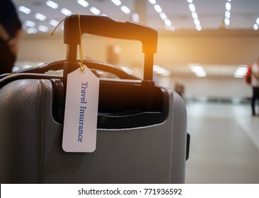 Travel Insurance Tag On Suitcase Holder With Tag Tied Letters Enjoyable Your Trip On Bag. Travel Insurance Is Intended Cover Medical Expenses, Cover Lost Luggage, Flight Cancellation Or Accident.