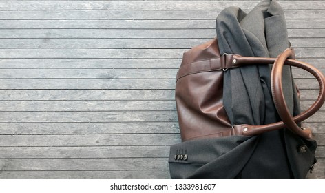 Travel Light With Weekend Bag And Suit