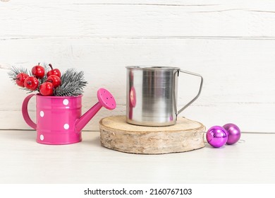 Travel Mug Mockup. Metal Mug On The Table With Balls And Fir Branches.