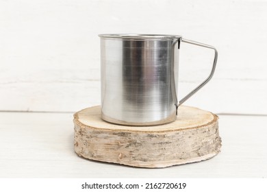 Travel Mug Mockup. Metal Mug On The Table. Add Your Design.