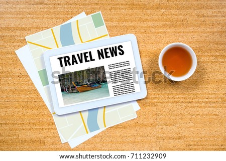 travel news, concept with digital tablet over paper city map