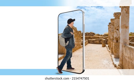 Travel Online. Booking Tours Online. Virtual Tours. A Man With A Backpack Steps Into The Smartphone Screen. A Person Makes A Virtual Journey. Advertising Of A Travel Company With A Place For Text.