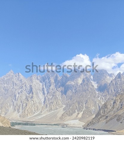 
Travel Pakistan to witness the famous Passu Cones Glacier and marvel at the stunning landscapes of the Karakoram Highway, surrounded by high mountains and icy peaks in the picturesque Hunza Valley.