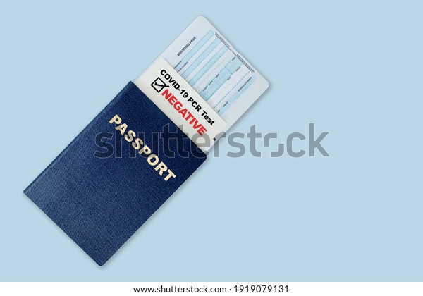 Travel\
passport, boarding pass and negative test result of COVID-19 PCR\
test. Concept of new normal future air or land border travel with\
proof of Coronavirus testing\
requirement.