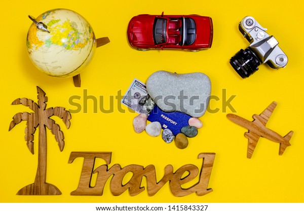 Travel\
planning concept. Items on a yellow background.\

