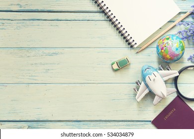 Travel Planning On Wooden Background