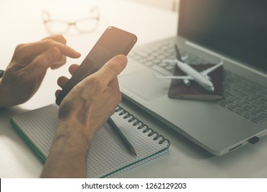 travel planning - using smart phone for online flight ticket and hotel booking
