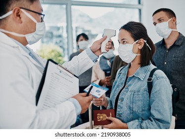 Travel Restriction, Covid Pandemic And Temperature Check At Airport. Asian Female Wearing Mask For Corona Virus Prevention Waiting In Departure Inspection Line, Doctor Pointing Digital Thermometer.