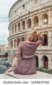 Travel in Rome. Back view of beautiful girl visiting Colosseum landmark. Summer holidays in Italy. - Shutterstock ID 1633419766