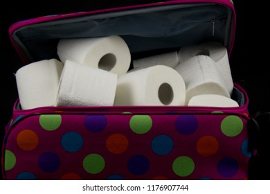 Lady´s Travel Suitcase Full Of Toilet Paper.White Toilet Paper In A Travel Suitcase With Dots.Intestinal Problems, Abdominal Pain, Diarrhea On Vacation.