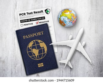 A travel theme with generic passport and a card that shows Negative PCR test result for Covid-19. - Shutterstock ID 1944715609