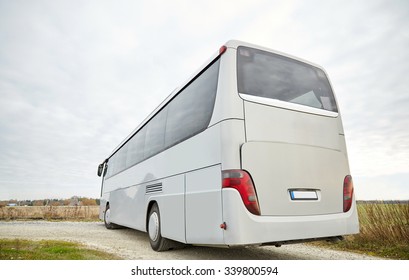 Travel, Tourism, Road Trip And Passenger Transport - Tour Bus Driving Outdoors From Back