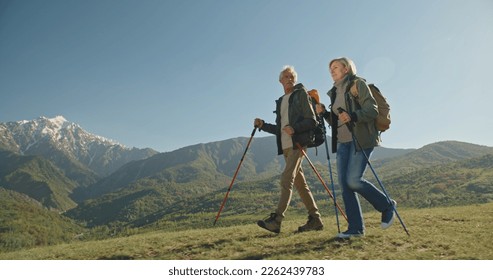 Travel and tourism. Senior family couple enjoying view together on ancient amphitheater. - Powered by Shutterstock