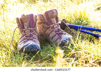 travel. the tourist goes on a hike through the mountains - a boots and Trekking poles - Shutterstock ID 1160515177