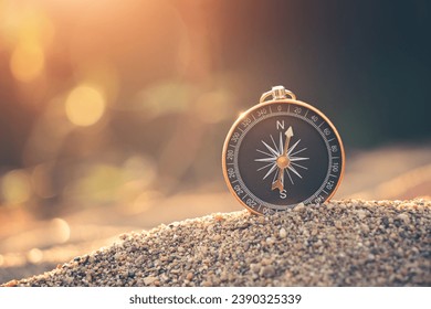 Travel of tourists with compass. compass of tourists on sandy beach. - Powered by Shutterstock