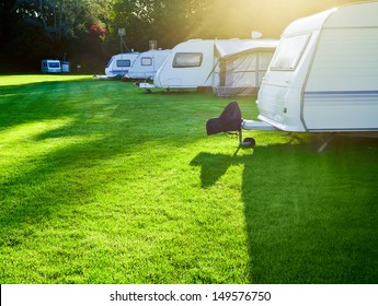 Travel trailer camping in a morning light - Shutterstock ID 149576750