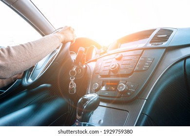 Travel Trip Car. Happy Young Woman Inside Vehicle Driving In Sunny Day. Fun Driver Ride In Winter Vacation Concept