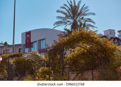 Travel Turkey Background Concept. Turkish Flag, Building And Nature On Sunny Day.