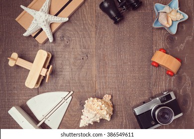 Travel And Vacation Concept Background On Wood. View From Above. Flat Lay