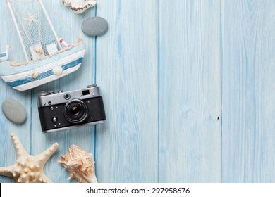 Travel And Vacation Items On Wooden Table. Top View With Copy Space