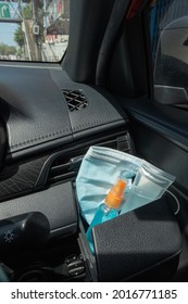 Travel And Vacations Concept, Medical Mask, Hand Sanitizer Spray Placed On Console Inside The Car, Preparation Of Portable Disinfecting Alcohol Spray, Prevention Of Covid-19, Health Care, New Normal.