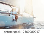 Travel, water and couple on boat by ocean for vacation, getaway or weekend trip for romantic date. Love, sailing and mature man and woman on yacht for holiday adventure together by sea at sunset.