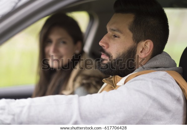 Traveler couple in\
car