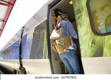 Traveler Getting On A Train