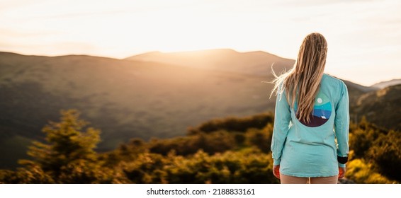 Traveler hiking with backpacks. Hiking in mountains. Sunny landscape. Tourist traveler on background view mockup. High tatras , slovakia - Shutterstock ID 2188833161