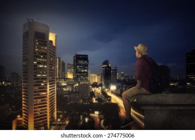 4,269 Man Sitting On Top Of Building Images, Stock Photos & Vectors ...