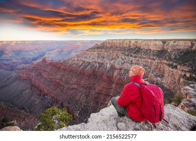 Traveler on cliff mountains over Grand Canyon National Park, Arizona, USA.Inspiring emotion. Travel Lifestyle journey success motivation concept adventure  vacations outdoor concept. - Powered by Shutterstock