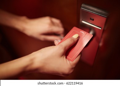 Traveler Opening Hotel Room Door By Plastic Keycard