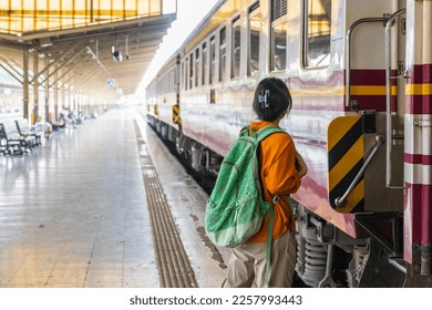 A traveler riding a train. - Shutterstock ID 2257993443