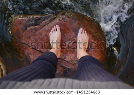 Traveler standing on a red rock in Sedona, Arizona, USA