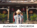 Traveler at Thien Hau Pagoda, dedicated to the Chinese sea goddess Mazu , in Cholon, the Chinatown area of Saigon